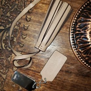 Coach bag tassel and tag
